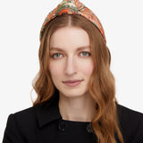 Pertinent Knotted Headband in Orange Paisley